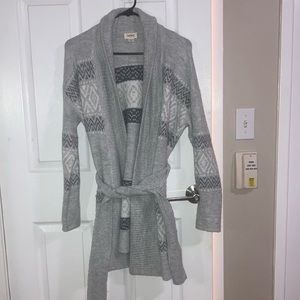 Cozy mid-length sweater. Indoor, outdoor use.